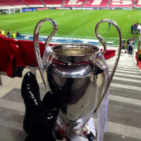 PIC: Xabi Alonso Puts His Feet Up As He Sits With The Champions League Trophy In An Empty Stadium